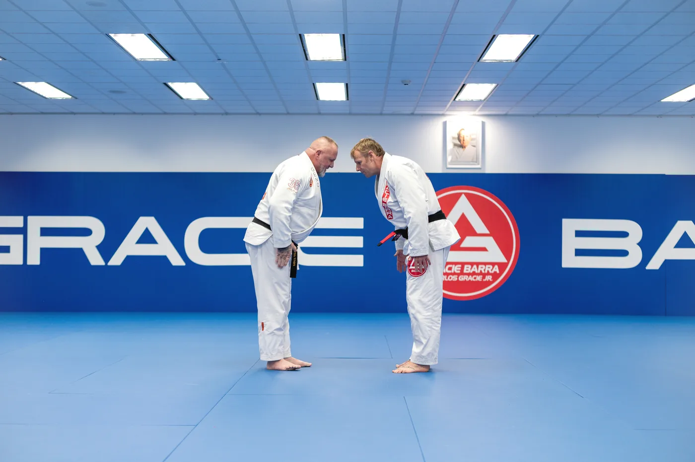 Two adult students bowing before a Jiu-Jitsu session at Gracie Barra Leamington Spa